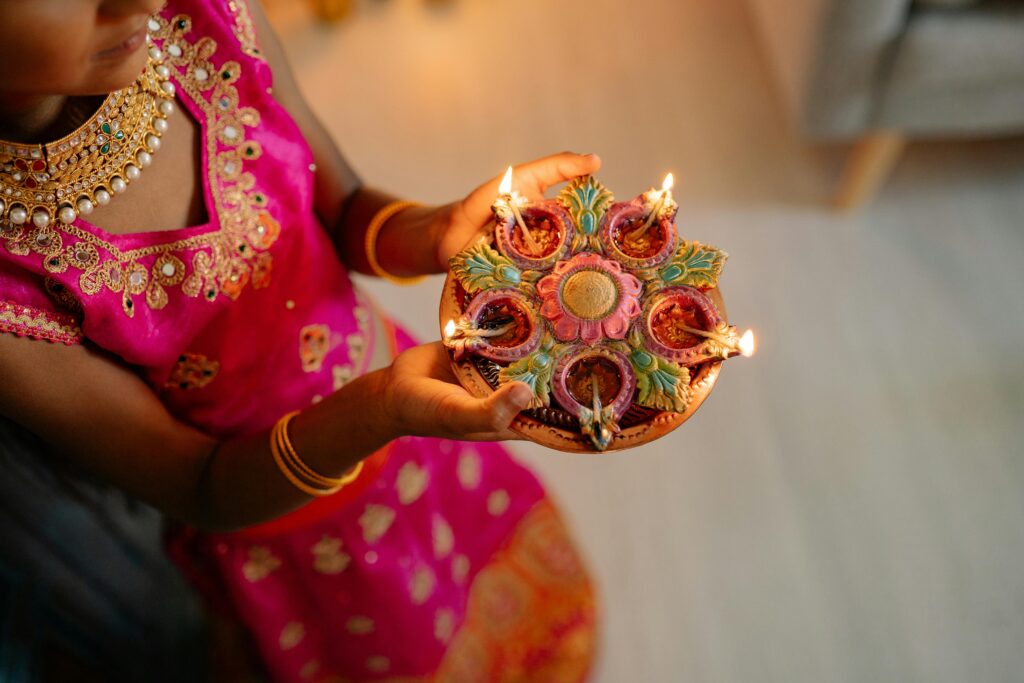 Hands decorated with jewellery for Diwali celebrations in India